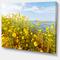 Designart - Little Yellow Flowers over Seashore - Large Flower Canvas Art Print